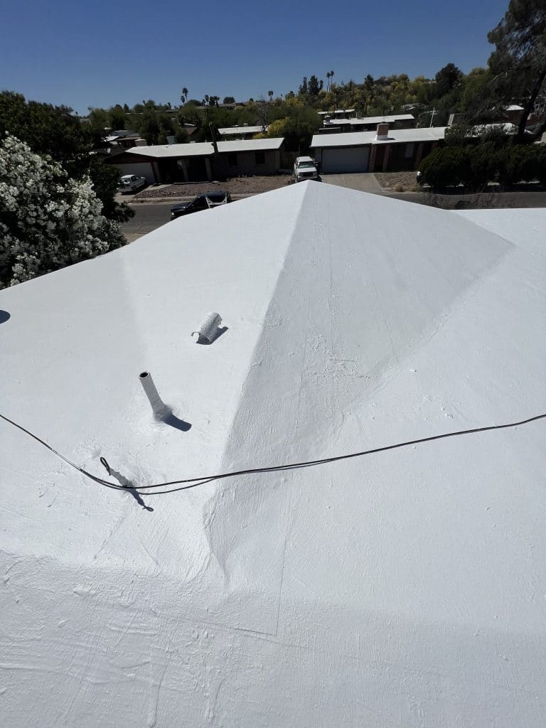Flawless white roof coating by Roofing Pros Az. Our coatings provide excellent UV protection and energy efficiency ideal for Arizonas sunny climate scaled