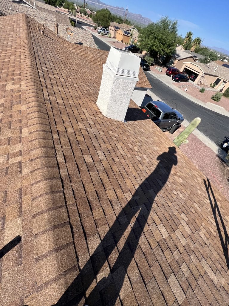 High quality brown shingle roof installation by Roofing Pros Az. Our commitment to excellence ensures a beautiful and durable roof for your home scaled