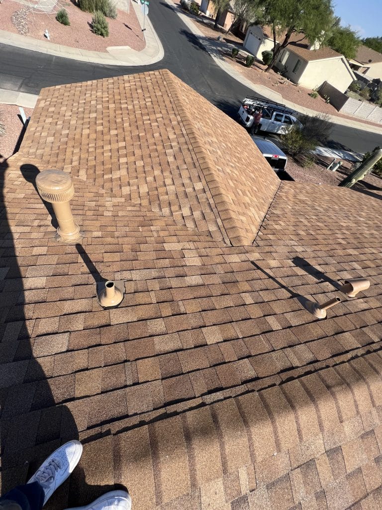 Meticulous brown shingle roof installation by Roofing Pros Az. Our expertise ensures a secure and attractive roofing solution for your home scaled